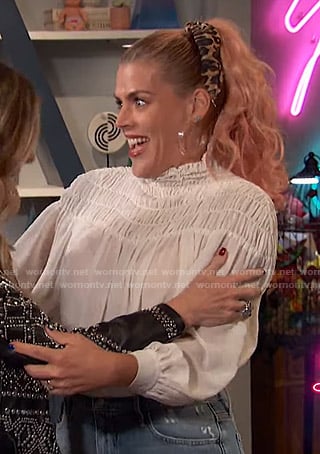 Busy's white smocked top on Busy Tonight