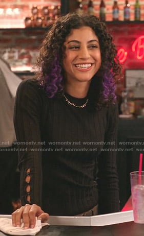 Heather's black button sleeve top and camo pants on Crazy Ex-Girlfriend