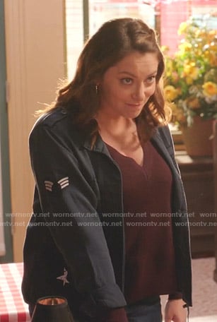 Rebecca's navy military jacket on Crazy EX-Girlfriend