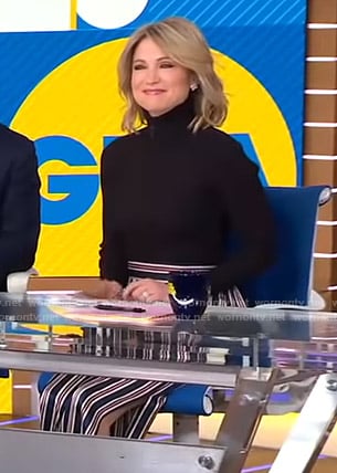 Amy's black turtleneck sweater and striped slit pants on Good Morning America