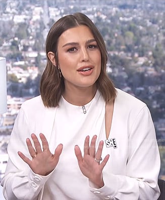 Carissa's white cutout tie neck top on E! News Daily Pop