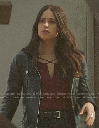 Liz's red cross strap top and black jeans on Roswell New Mexico