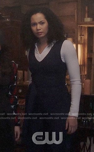Macy's white zip neck sweater and navy jumpsuit on Charmed