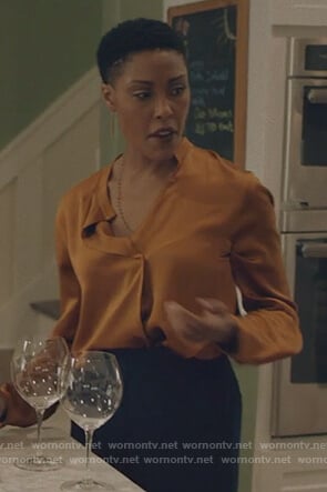 Lynn's Orange silk blouse on Black Lightning
