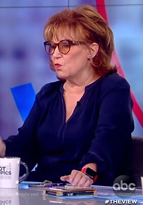 Joy's navy split neck top on The View
