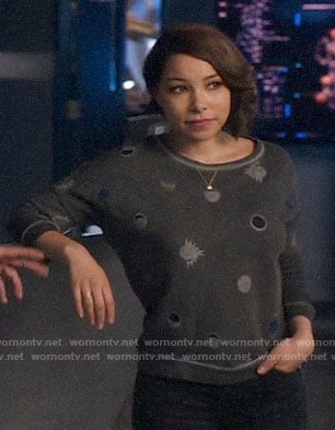 Nora's eclipse print sweatshirt on The Flash