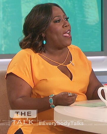 Sheryl's yellow strappy top on The Talk