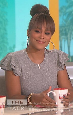 Eve's metallic flutter sleeve top on The Talk
