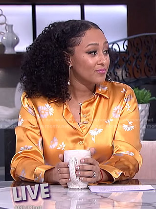 Tamera's orange floral blouse and trousers on The Real