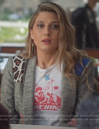 Nomi's white Marchin tee and mixed print coat on Grown-ish