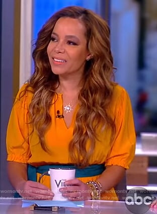 Sunny's yellow contrast waist dress on The View