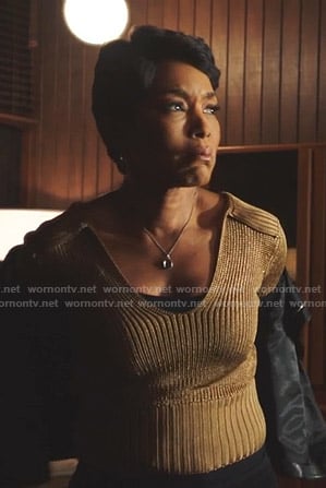Athena's gold ribbed sweater on 9-1-1