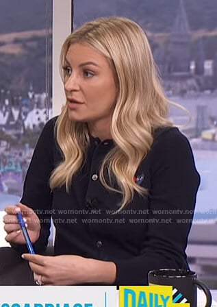 Moran's black cardigan with heart applique on E! News Daily Pop