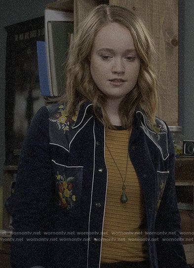 Abby's yellow striped tee and floral western shirt on Santa Clarita Diet