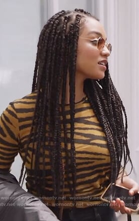 Kat's brown tiger stripe top on The Bold Type