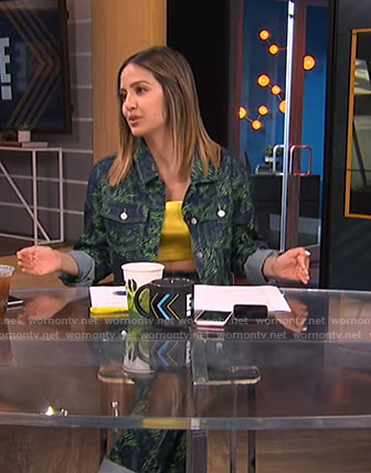 Erin's blue and green animal print jacket and jeans on Live from E!