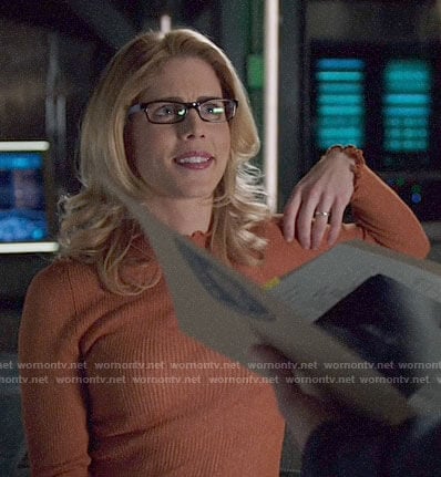 Felicity's orange ruffle trim top on Arrow