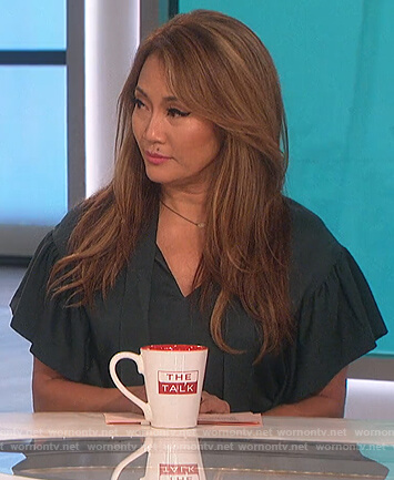Carrie's green tie neck blouse on The Talk