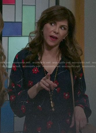 Janis's navy poppy print dress on Modern Family
