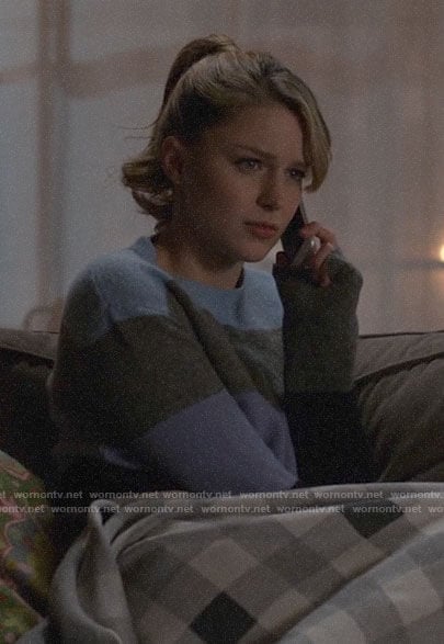 Kara's purple and blue striped sweater