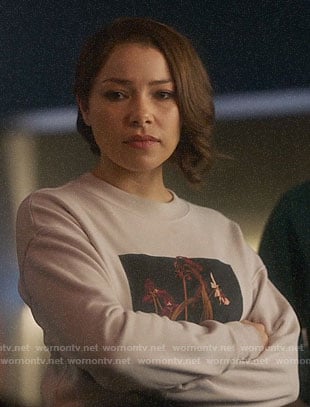 Nora's flower graphic sweatshirt on The Flash