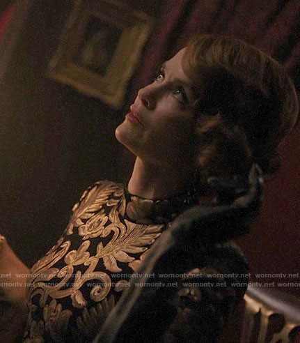 Penelope's black and gold patterned dress on Riverdale