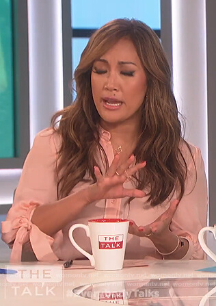 Carrie's pink tie cuff blouse on The Talk