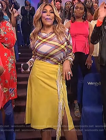 Wendy's plaid sweater and yellow fringe skirt on The Wendy Williams Show