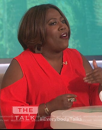 Sheryl's red cold shoulder top on The Talk