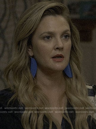Sheila's blue earrings on Santa Clarita Diet