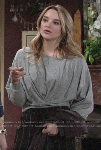 Summer's grey twist front sweater and striped pants on The Young and the Restless