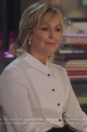 Jacqueline's white contrast button blouse on The Bold Type