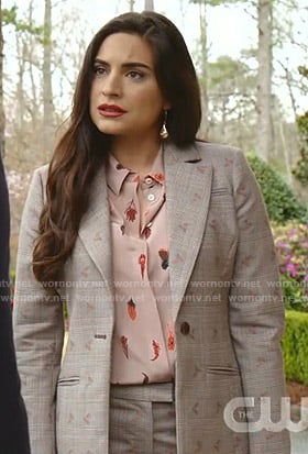 Cristal's pink feather print blouse and grey plaid suit on Dynasty