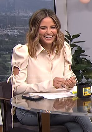 Erin's white cutout tie sleeve blouse on E! News Daily Pop