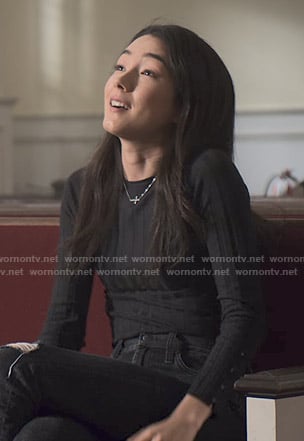 Helena's black ribbed button sleeve top on The Society