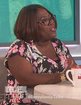Sheryl's floral zip down top on The Talk