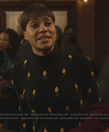 Lucca's black rose embroidered sweater on The Good Fight