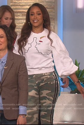 Eve's embroidered sweater and camo pants on The Talk