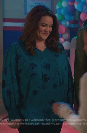 Katie's green floral print blouse on American Housewife
