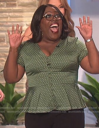 Sheryl's green polka dot top on The Talk