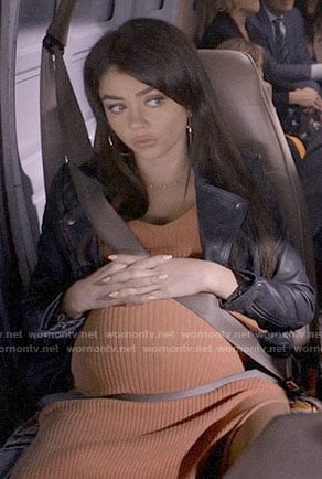 Haley's orange ribbed maternity dress and leather jacket on Modern Family