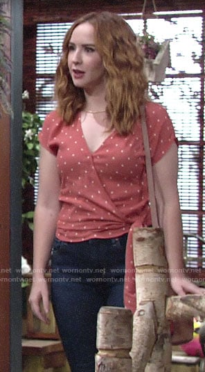 Mariah's orange polka dot wrap top on The Young and the Restless