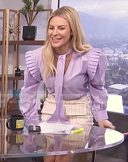 Morgan's purple tie neck top and mini skirt on E! News Daily Pop