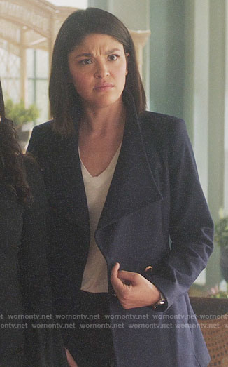 Niko's short navy coat on Charmed