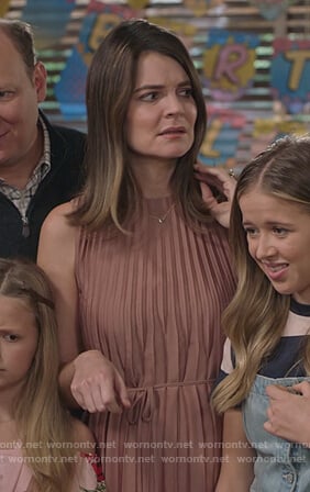 Heather's pink pleated dress on Life in Pieces