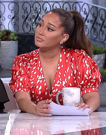 Adrienne's red satin top and skirt on The Real