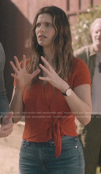Rio's orange wrap top on Bless This Mess