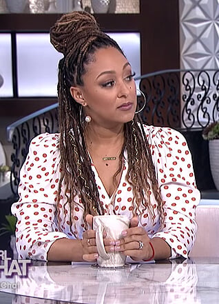 Tamera's white polka dot wrap top on The Real
