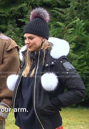 Hannah's black down jacket with pom poms on The Bachelorette
