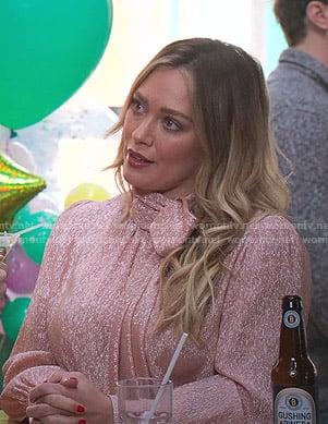 Kelsey's metallic tie neck blouse on Younger